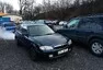 Má stařičká Mazda 323f s poslením vzdechem, všimni si přední kola mírně šejdrem...
