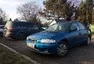 Mazda 323f sedan r. 1997 od novoty v jedné rodině...