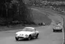Clark pronásleduje Colina Chapmana, Brands Hatch, 1958.