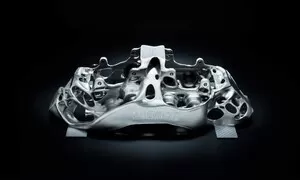 Novinky: Bugatti vyrobilo obrovský titanový brzdič za pomoci 3D tisku