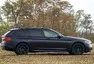 BMW 540i xDrive: Polštářky, dříví a rychlost.