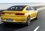 První vlaštovky ze Ženevy: Bentley pro dva, vysmátý Passat a dieselelektrické Audi