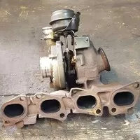 Turbo před repasem, střed se vyosil a lopatky si tam už dělali jakékoliv pohyby co se jim zamanuly