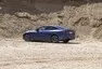 BMW i4 M50 a rozmazaný svět za oknem