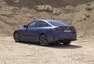 BMW i4 M50 a rozmazaný svět za oknem