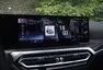 BMW i4 M50 a rozmazaný svět za oknem