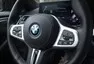 BMW i4 M50 a rozmazaný svět za oknem