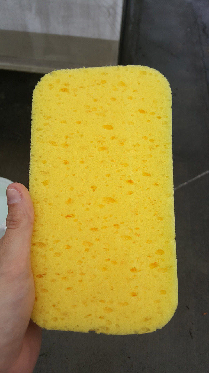 Klasická mycí houba, zbrusu nová.